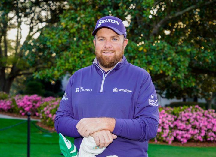 Irish Golfer Shane Lowry in professional golf clothing with the Wayflyer logo on the chest.