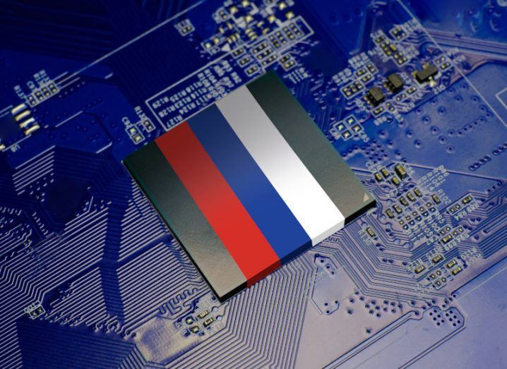 Russian flag on a CPU electronic chip, with a circuit board background.