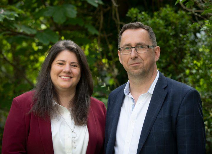 Deciphex COO Dr Mairin Rafferty and CEO Donal O'Shea standing together with green plants in the background.