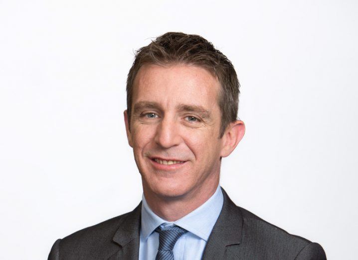 Headshot of Val Gabriel, the new MD of HP Ireland, wearing a suit.