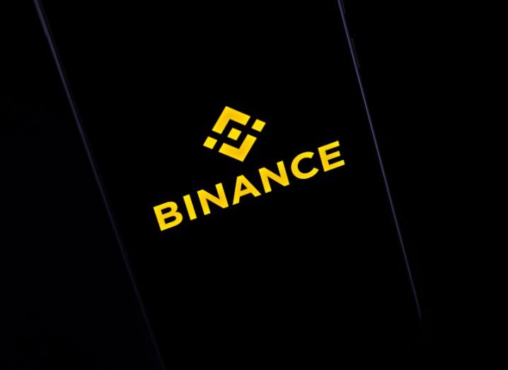 Binance logo in yellow on a black background.