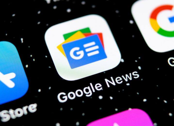 A close-up of a phone screen showing the Google News app.