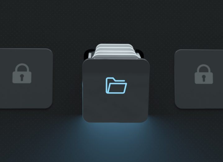 A black square with a file icon that is lit up, with files popping out from the top of it. There are similar sized squares on either side with a lock icon on them.