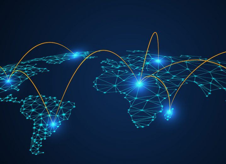 Illustration of a digitised map of the world with several network points and connections lit up in blue and yellow.