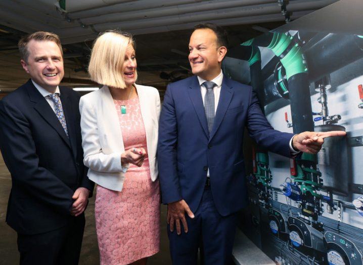 James Browne, Pippa Hackett and Leo Varadkar look at the energy controls in a hotel to launch the new green transition fund.