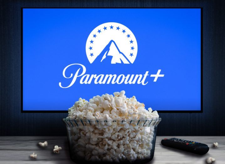 Paramount+ logo on a TV screen with a bowl of popcorn in front of it.