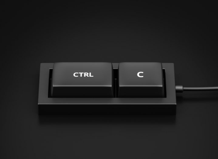 Black computer keyboard buttons for Ctrl and C placed next to each other, signifying the ‘Copy’ shortcut.