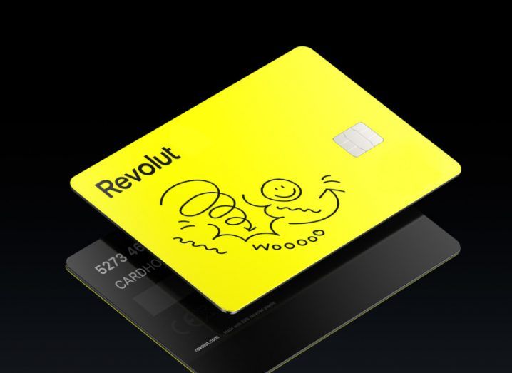 A bright yellow Revolut card designed for junior users.