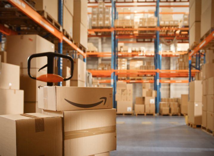 Boxes with the Amazon logo kept inside a distribution centre.