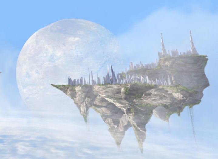 Virtual image of a floating island with buildings on it and a moon in the distance, with clouds underneath. A metaverse concept.