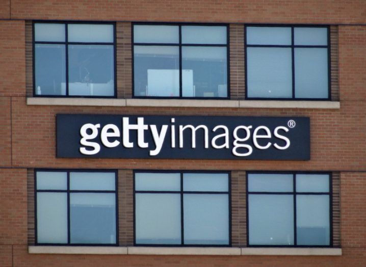Getty Images logo on the side of a brown building with windows.