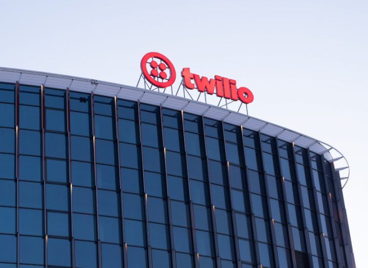 The Twilio logo on the roof of a building.