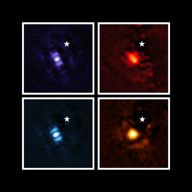 Four squares in a black background with each showing a blurry light in different colours. Each square also has the symbol of a star in it.
