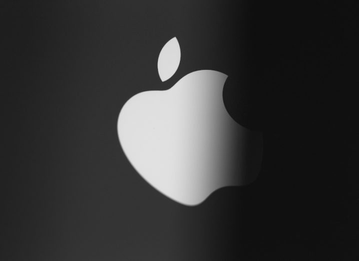 Apple logo on an iPhone back cover partially hidden.