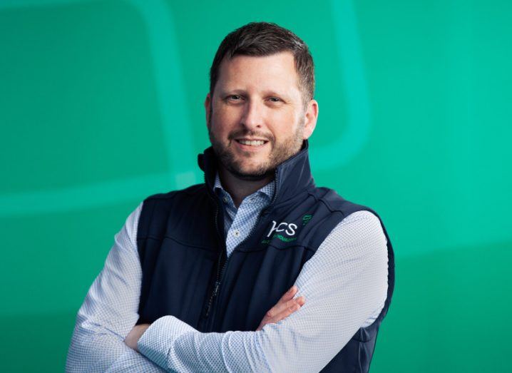 Dan Hegarty, head of sales at HCS, standing with his arms folded.