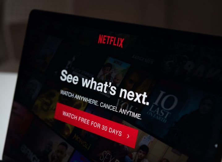 Netflix website open on a laptop screen that reads "See what's next".