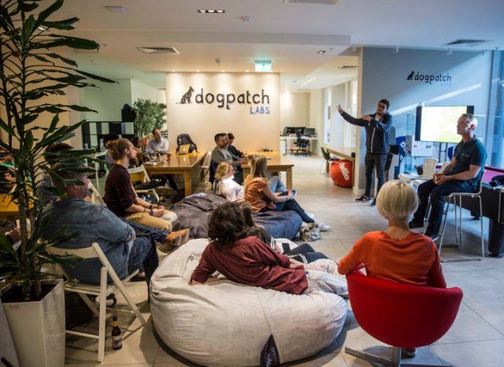 Dogpatch Labs indoor event with a person addressing a small audience.