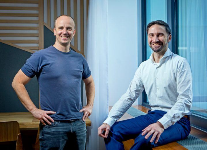 Superface founders next to each other in an indoor office space.