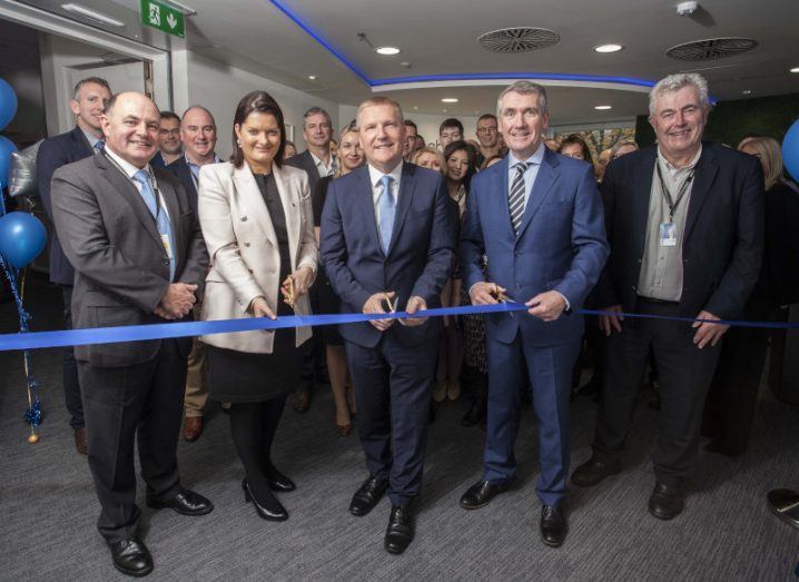 A group of people at the ribbon cutting ceremony to open the newly redeveloped Cork Customer Solution Centre in Cork.