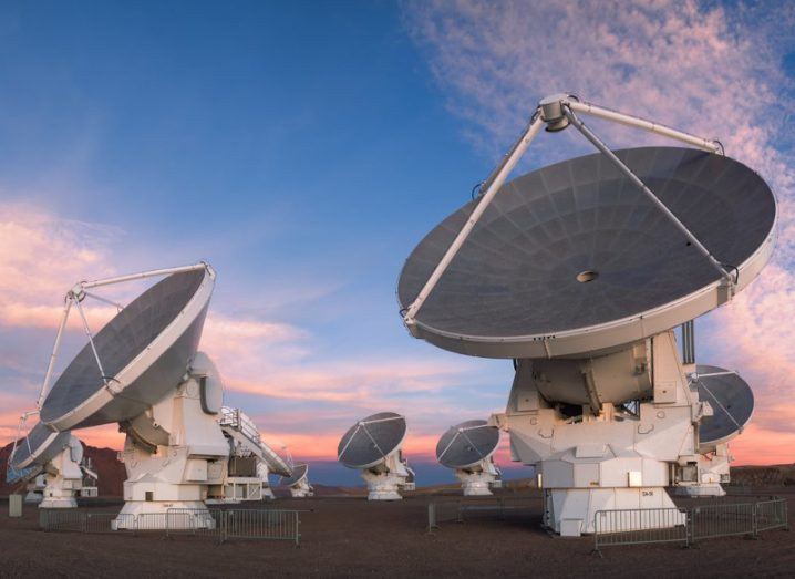 ALMA telescope dishes in Chile facing the sky.