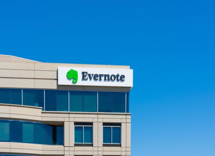 Evernote logo on top of a building with a blue sky in the background.
