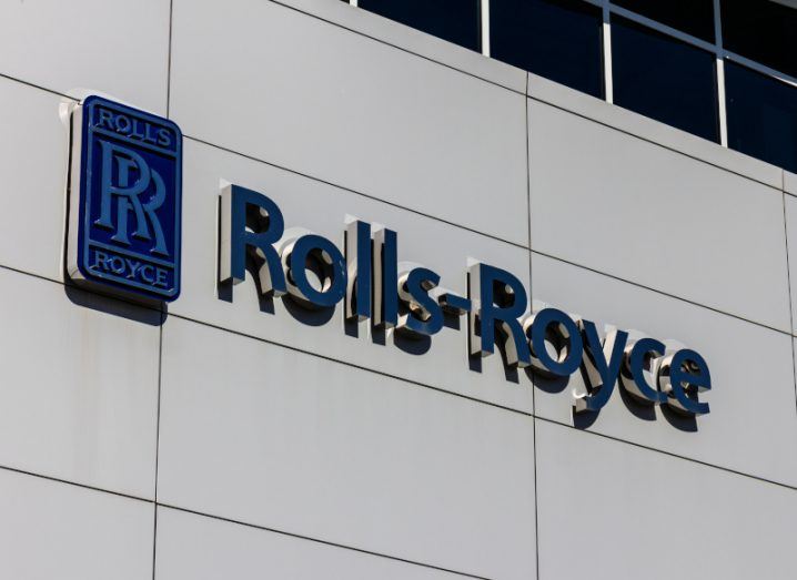 Rolls-Royce logo on a building.
