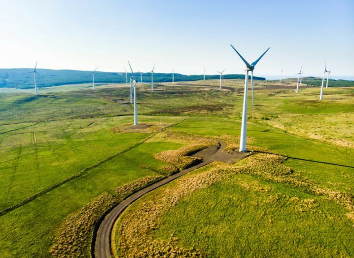 Aerial view of wind turbines in grassy fields of Galway.