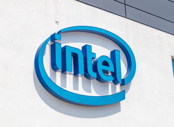 Intel company logo on the side of a white building wall.