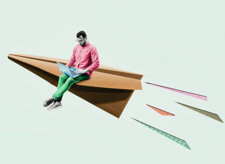 A collage of a man with a laptop sitting on a giant paper aeroplane. It represents a new start-up launching after the founder has gotten tips about funding.