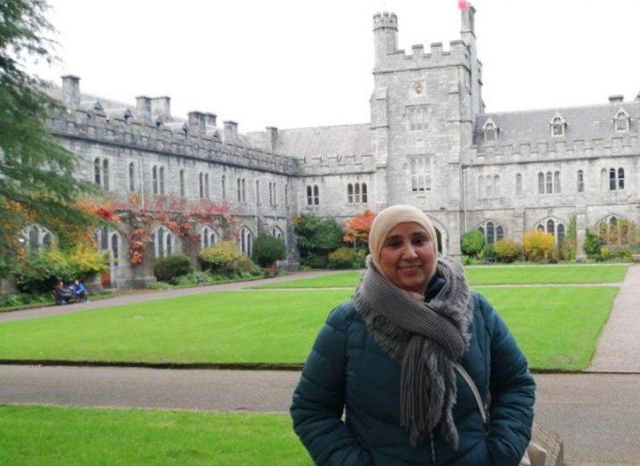 Researcher Radhya Sahal stands on the UCC campus.