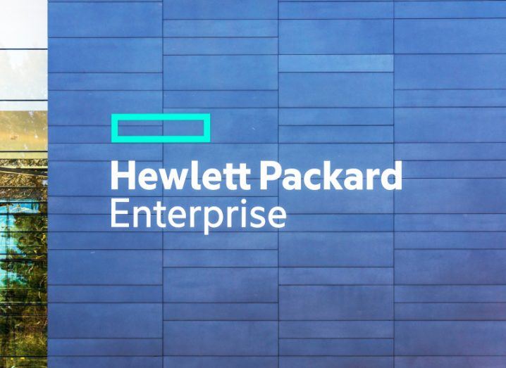 Hewlett Packard Enterprise or HPE logo, on the wall of a building.