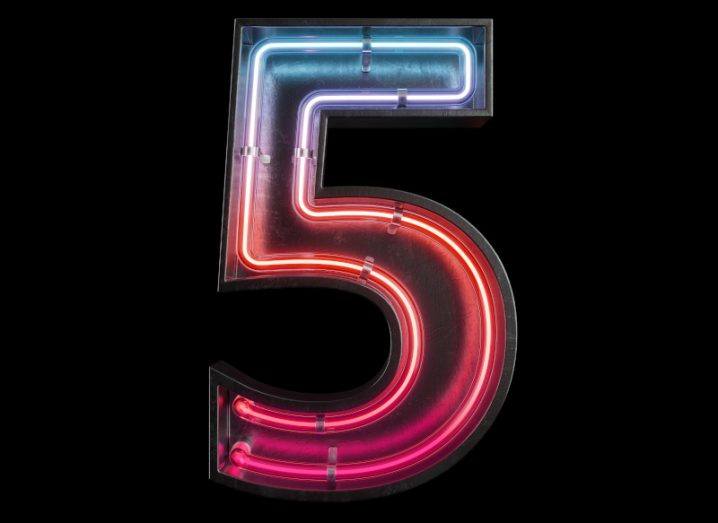 A large neon sign depicting the number five on a black background.
