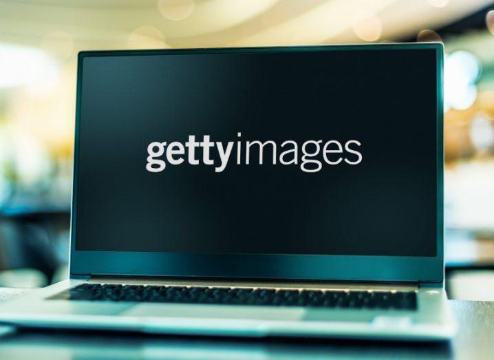 The Getty Images logo on a laptop screen, with a blurred room in the background.