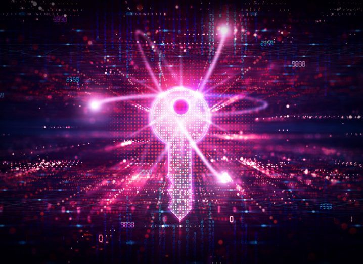 A digital illustration of a key constructed by small purple LED lights, with the spirals of an atom flowing through it on a background of pink and purple digital LED lights.