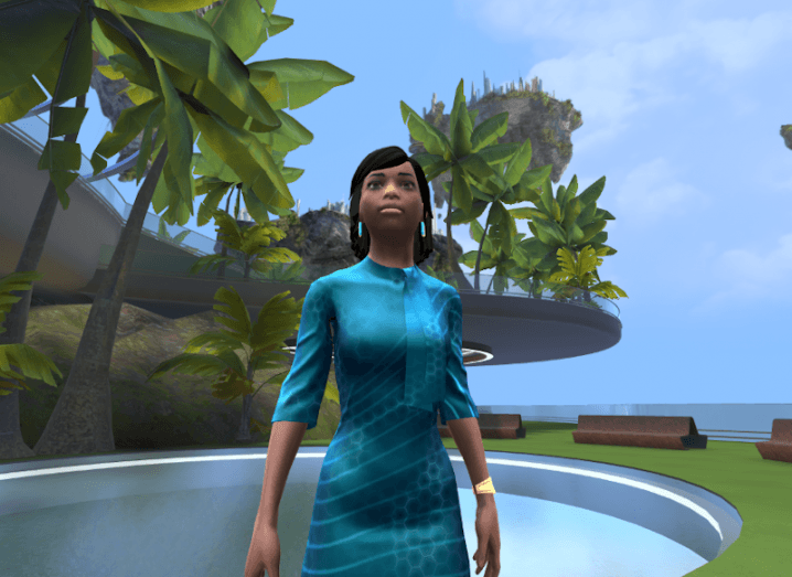 A computerised image of a female avatar standing in a wide, open space surrounded by trees. It was created by Engage XR.