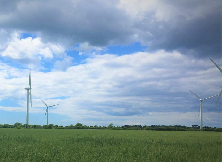 SSE Renewables wind farm in Wexford with wind turbines visible against a cloudy sky.