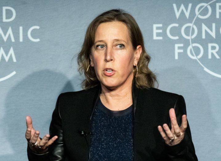 Former YouTube CEO Susan Wojcicki speaking with the World Economic Forum in the background.