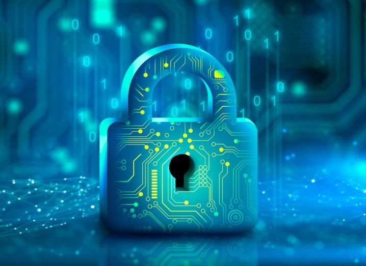 A green-blue digital lock illustration symbolises cybersecuriity and resilience with nodes going off it and into the background.