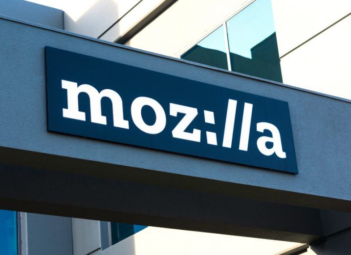 The Mozilla logo on the side of a building wall.
