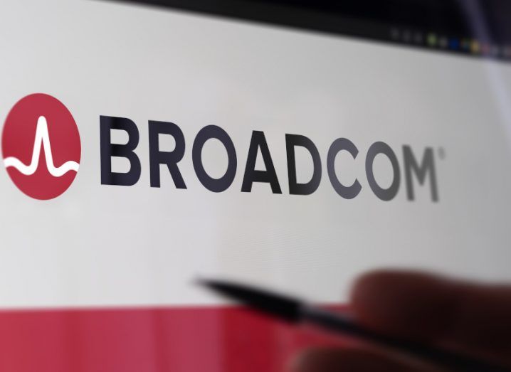 A pen pointing at a Broadcom logo on a screen.