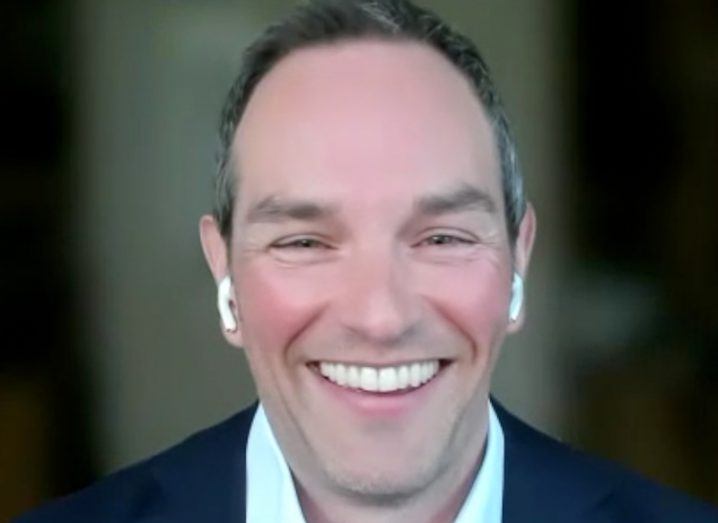 Headshot of Dominic Ward smiling.