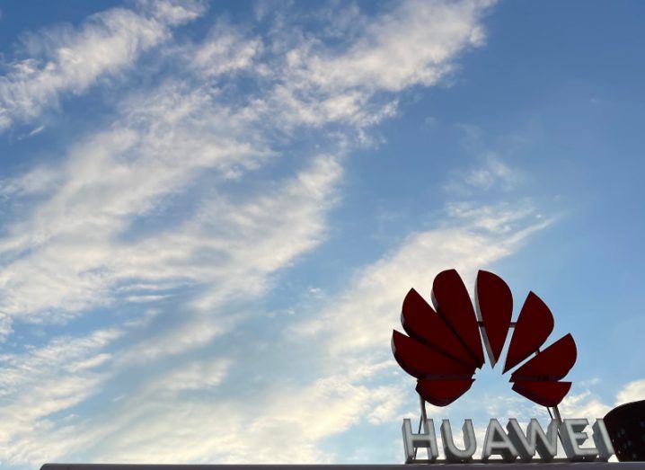 Huawei logo against a backdrop of a blue sky at MWC Barcelona.