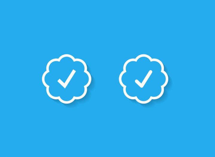 Two Twitter Blue verification ticks, in a blue background.