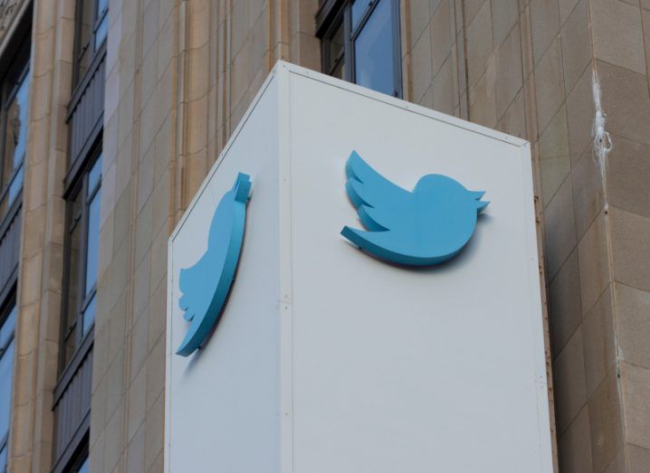 The Twitter bird logo on the side of a building.