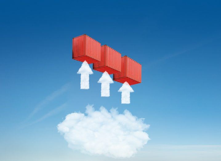 Container security concept showing three red boxes in the sky with white arrows ascending towards them from a cloud.