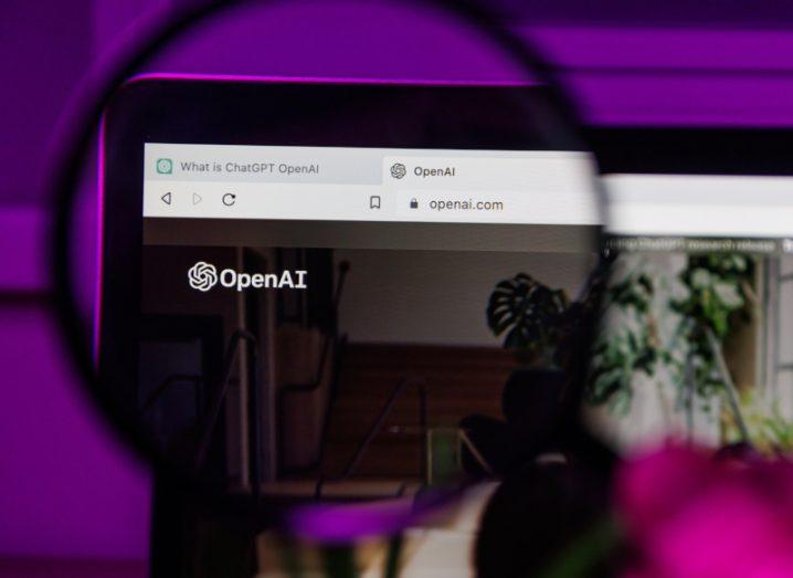 A magnifying glass provides a close-up of a computer screen where two browser tabs are shown. One depicts a web page asking 'What is ChatGPT?' and the other is OpenAI's website.
