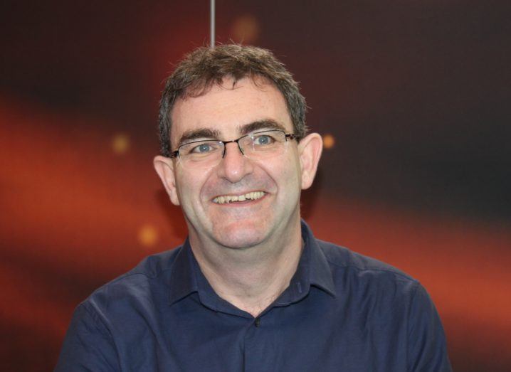 A headshot of cybersecurity expert Brian Honan wearing a dark navy shirt.