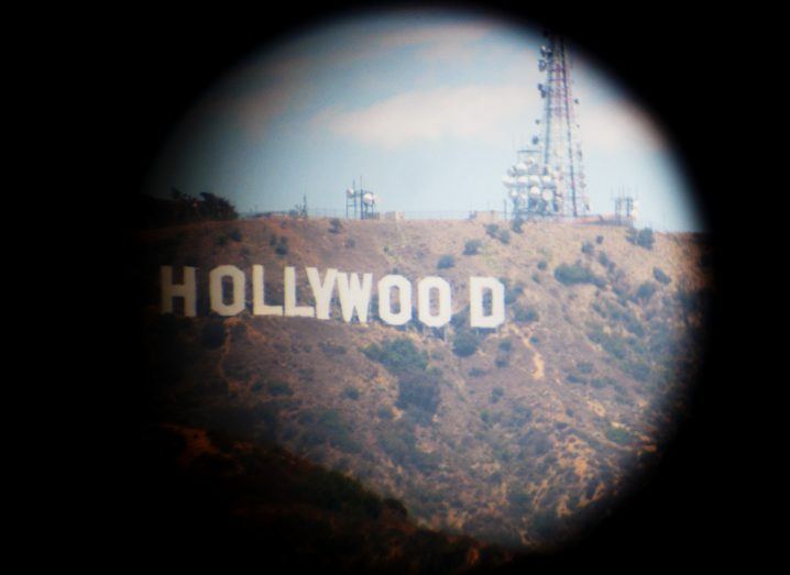 Hollywood sign in California as seen through a lens.