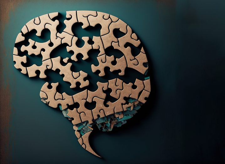 Jigsaw puzzles shaped in the form of a human brain with some pieces missing. Symbolises Alzheimer's disease.