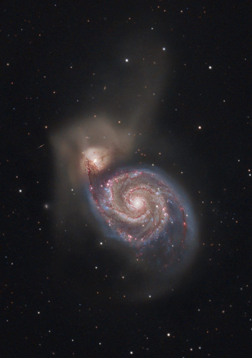 An image of a spiral galaxy, with other stars visible in the space around it.